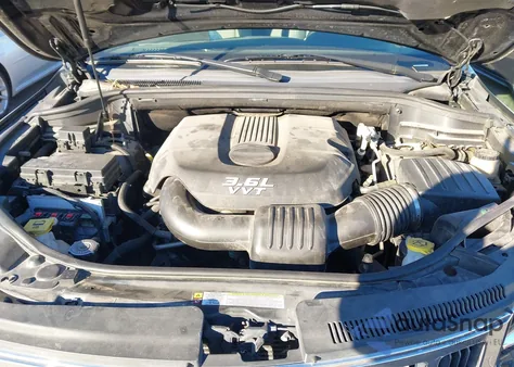 2013 Jeep Grand Cherokee Laredo z USA, uszkodzony, nr VIN 1C4RJFAG6DC607799